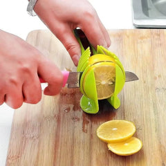 Slice it right! 🍊🍅 The ultimate stainless steel handheld slicer for oranges, lemons, tomatoes, and onions! #KitchenGadgets #FoodieEssentials thumbnail 7