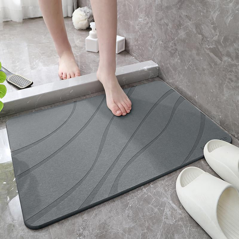 Transform your bathroom with SØLVSTONE's Quick Dry Stone Mat - Wave your way to style and comfort! 🌊✨