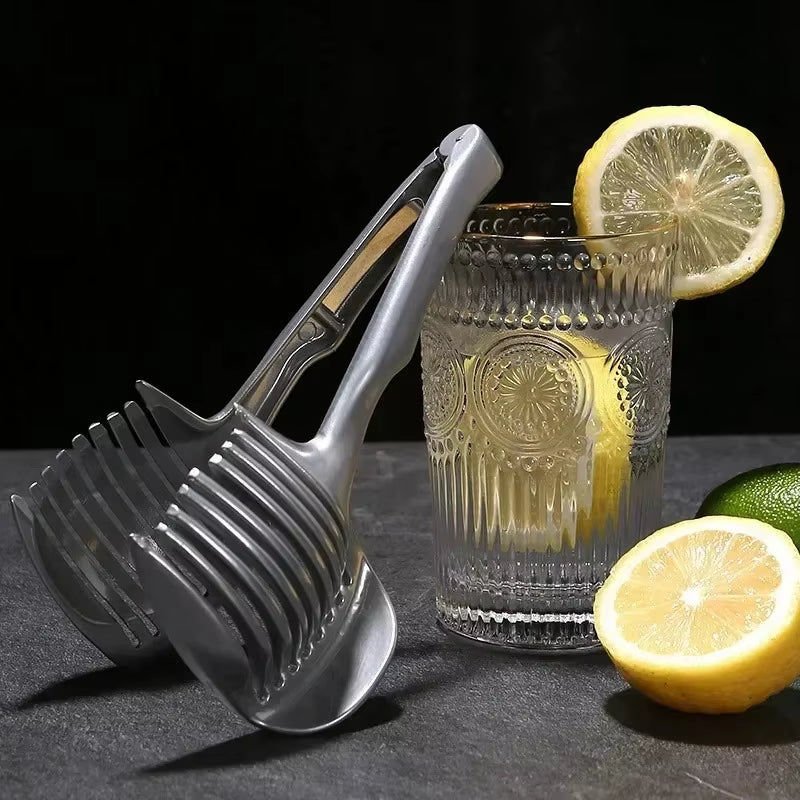 Slice it right! 🍊🍅 The ultimate stainless steel handheld slicer for oranges, lemons, tomatoes, and onions! #KitchenGadgets #FoodieEssentials