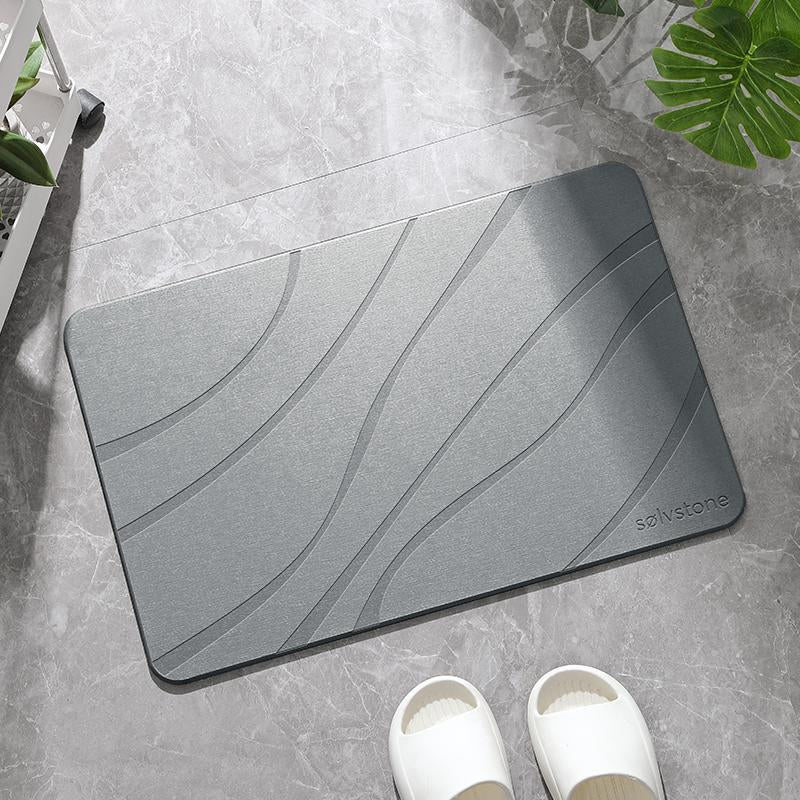 Transform your bathroom with SØLVSTONE's Quick Dry Stone Mat - Wave your way to style and comfort! 🌊✨