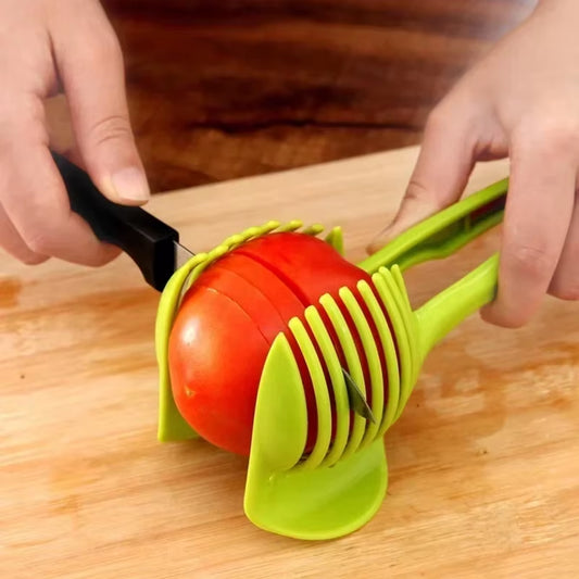 Slice it right! 🍊🍅 The ultimate stainless steel handheld slicer for oranges, lemons, tomatoes, and onions! #KitchenGadgets #FoodieEssentials