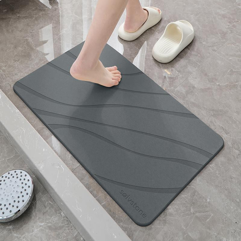 Transform your bathroom with SØLVSTONE's Quick Dry Stone Mat - Wave your way to style and comfort! 🌊✨
